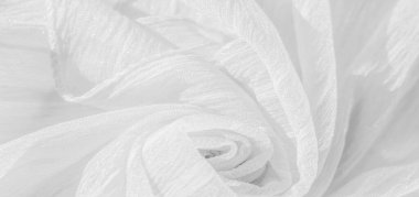 İpek kumaş. Beyaz buruşuk kumaşın dokusu. Beyaz buruşuk, dalgalı yüzey dokusu. Yakın çekim, yumuşak odaklanma. arkaplan, kalıp