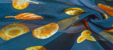 İpek kumaş, mavi ve sarı sonbahar yaprakları. Doku, arkaplan deseni