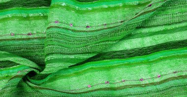 Green wool scarf. A quality and delicate scarf that gives an elegant and upscale look to any design. smooth sequined striped prints
