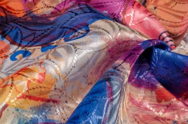 Boyalı bir palette ipek kumaş, soyut çizim, parlak renkler, kırmızı-sarı-mavi renk, sınırsız hayal gücü. doku, arkaplan, desen,