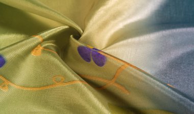 Arkaplan dokusu, ipek kumaş, parlak yeşil yeşil renk, küçük soyut kaya resimleri..