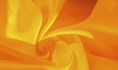 Limon sarısı ipek kumaş, pürüzsüz saten kumaş. Doku, arkaplan, desen