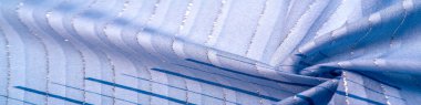 Gök mavisi ve beyaz kayganlaştırıcı çizgileri olan mavi kumaş. Taze ve rahat bir tarz için mükemmel. Doku arkaplanı