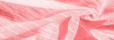 İpek kumaş. Kırmızı kırışık kumaş dokusu. Kırmızı buruşuk peri dokusu dalgalı yüzey, yakın çekim, yumuşak odak. arkaplan, kalıp