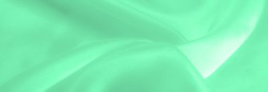 Yeşil soluk ipek kumaş, pürüzsüz kırmızı ipek ya da lüks saten kumaş, düğün arka planı olarak doku. Lüks arka plan tasarımı. Retro biçimi.