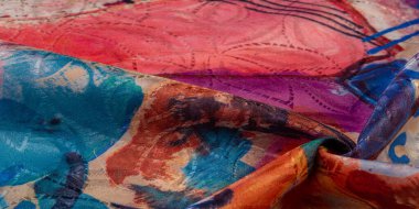 Boyalı bir palette ipek kumaş, soyut çizim, parlak renkler, kırmızı-sarı-mavi renk, sınırsız hayal gücü. doku, arkaplan, desen,