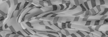 Siyah geometrik eşkenar dörtgen şekilli beyaz ipek kumaş. Karanlık. Geçmişi. Şablon.