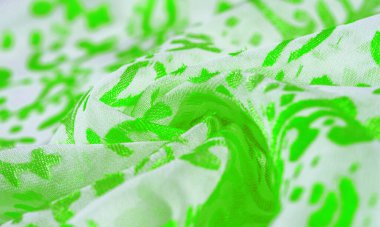 İpek kumaş, yeşil kumaş. Beyaz arka planda zarif çiçeklerin gölgeleri, Paisley 'nin fotoğrafı. Doku, desen, koleksiyon