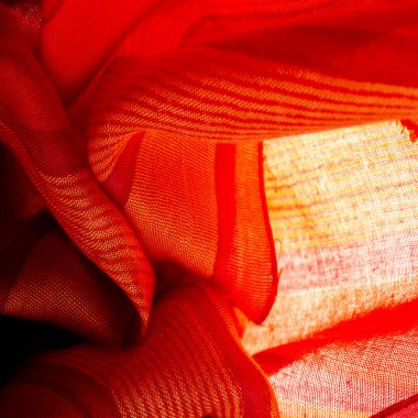 fabric red-burgundy, with a print of yellow lines. wine from Burgundy fabric color Texture. Background.