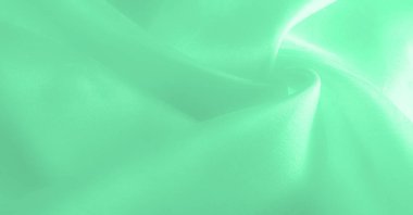 Yeşil soluk ipek kumaş, pürüzsüz kırmızı ipek ya da lüks saten kumaş, düğün arka planı olarak doku. Lüks arka plan tasarımı. Retro biçimi.