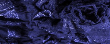 Doku. Koyu mavi kumaş. Noel kadınsı kraliyet partisi için dekoratif bir altyapı. Şatafatlı, deri desenli duvar kağıdı desenli. Doğum günü davetiyeleri için arka plan. Açık pastel renk