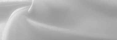 Beyaz ipek kumaş, pürüzsüz beyaz ipek ya da lüks saten kumaş, düğün arka planı olarak doku. Lüks arka plan tasarımı. Retro biçimi.