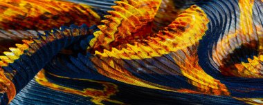 silk crimped. Blue, yellow, brown, burgundy colors. Ruffled silk fabric in vintage style. Floral pattern for elasticity. Opens the gathered fabric into pleasing and flattering folds.