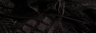 Siyah kadın dantelinden şal, siyah dantelden örgü, püskül, el örgüsü çiçek festivali tasarımından hediye düğün üçgeni gelin kartpostalı dokusu, arka plan, tasarım