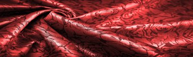 Çiçek desenli kırmızı ipek kumaş, güzel görünüş, eşsiz parlaklık kabartmalı desen, bileşik tekstil. rahatlama deseni