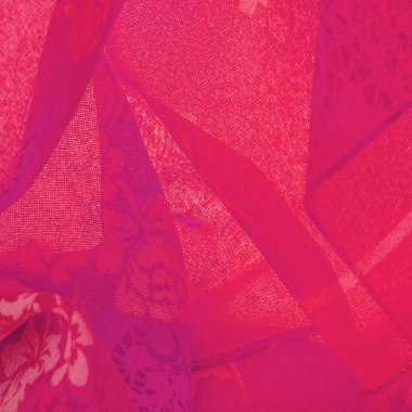 fabric, red silk with a floral pattern. Fragment of colorful retro silk textile pattern with floral ornament as background. Texture, design,