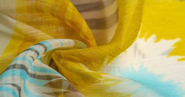 Renkli dantelli ipek kumaş. Sarı-mavi ve gri-mavi gözlükler. Tasarımlarınız, aksanlarınız, duvar kağıtlarınız, posterleriniz ve kartpostallarınız için mükemmel. doku, arkaplan, desen.