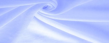 Mavi kumaş, lüks kumaşın soyut arkaplanı ya da dalgaların sıvı ipek dokusu ya da dalgalı kıvrımlar. arka plan ya da zarif duvar kağıdı tasarımı. Pamuk dokusu, doğal kumaş ve boya.