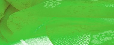 fabric, green silk with a floral pattern. Fragment of colorful retro silk textile pattern with floral ornament as background Texture, background, design,