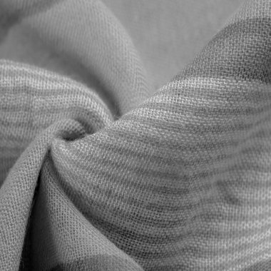 Tek renkli gri ipek kumaş, doku. Geçmişi. bir fotoğraf ya da resim siyah beyaz ya da sadece tek bir renkte farklı tonlarda geliştirildi ya da çalıştırıldı.