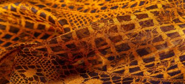 Kahverengi dantel kumaş, kehribar ve siyah kumaş karışımı. Kehribar, doku, arkaplan, desen.