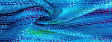 Kumaş mavi-turkuaz çizgili mavi-yeşil çizgiler, çok açık elastik forma, açık renk parıltı. desen arkaplan, desen kartpostal