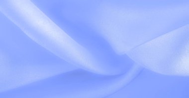 Mavi ipek kumaş, pürüzsüz mavi ipek ya da lüks saten kumaş, düğün arka planı olarak doku. Lüks arka plan tasarımı. Retro biçimi.