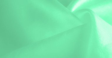 Yeşil soluk ipek kumaş, pürüzsüz kırmızı ipek ya da lüks saten kumaş, düğün arka planı olarak doku. Lüks arka plan tasarımı. Retro biçimi.