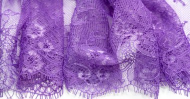 Blue lace fabric on a white background. Fancy African Lace Tulle  Fabric Polyester With Flowers All Over For Your Design