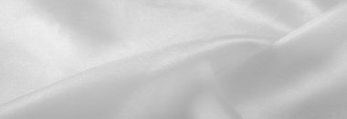 Beyaz ipek kumaş, pürüzsüz beyaz ipek ya da lüks saten kumaş, düğün arka planı olarak doku. Lüks arka plan tasarımı. Retro biçimi.