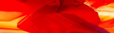 Kırmızı ipek kumaş, yakut rengi ipek kumaş, doku arka planı, makro. soyut tasarım.