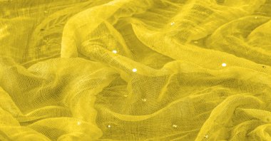 Renk simli şeffaf sarı kumaş, klasik ve modern tasarım kütüphanesiyle tanınıyor. doku, arkaplan