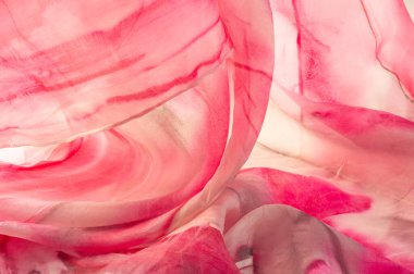 Kırmızı ve bej kumaşlar, bej arkaplanda kırmızı lekeler var. Soyut tasarımcı kumaş tasarımcısı. Tasarımın için güzel bir arka plan. Doku. Görüntü. çizim, kalıp, şekil