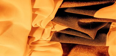 Sarı ipek kumaş. Tasarımlarınız, aksanlarınız, duvar kağıtlarınız, posterleriniz ve kartpostallarınız için mükemmel. doku arkaplan deseni.