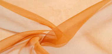 Soluk altın. Kahverengi İpek Bu zarif ipek kumaş mükemmel ince bir parıltı ve tam bir kumaşa sahiptir. doku, arkaplan, desen