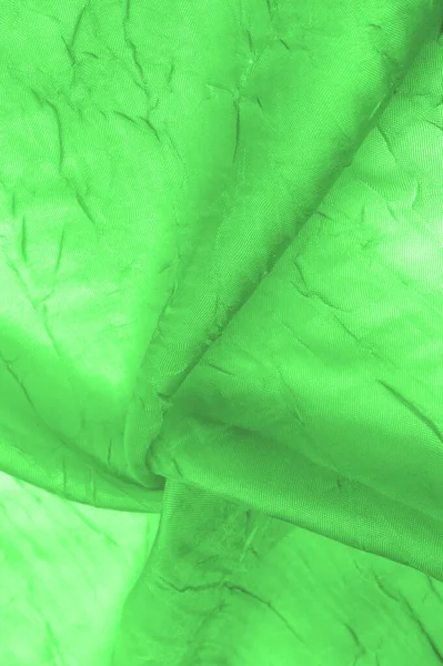 Jedwabny Materiał Jest Zielony Wygładzony Wygładzony Śladami Pasków Tło Tekstury — Zdjęcie stockowe