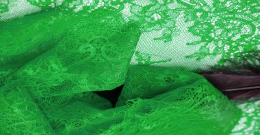 dantel kumaş. Kuş tüyü. Beyaz arka planda dantel rengi yeşil. Doku, şekil. İhtiyaçların için doğru şablonu seçme zamanı geldiğinde benim dokularıma güvenebilirsin..