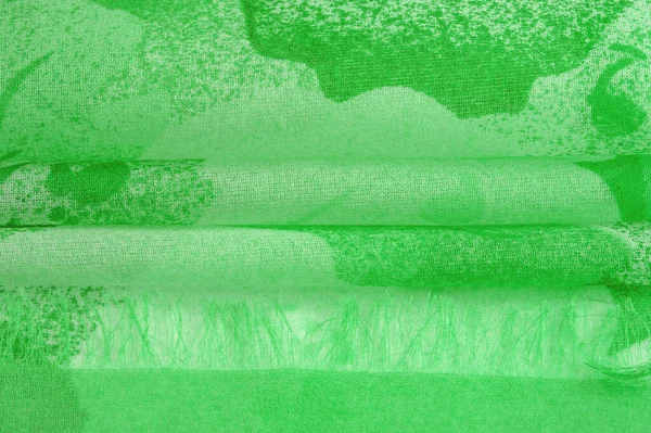 Abstract green silk chiffon fabric. Art mockup of spring green color taffeta silk fabric. Texture. background. template.