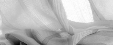 Tek renkli gri ipek kumaş, doku. Geçmişi. bir fotoğraf ya da resim siyah beyaz ya da sadece tek bir renkte farklı tonlarda geliştirildi ya da çalıştırıldı.