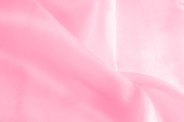 Kırmızı ipek kumaş, pürüzsüz kırmızı ipek ya da lüks saten kumaş, düğün arkaplanı olarak doku. Lüks arka plan tasarımı. Retro biçimi.