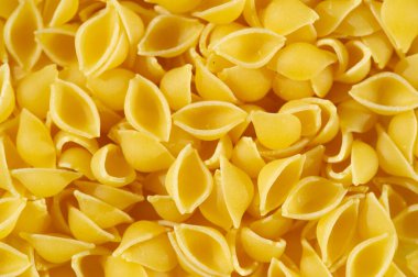 Orecchiette, from the Italian orecchia, meaning ear, and -etta, meaning small, are typical pasta in Puglia, a region of southern Italy. Grocery photography.