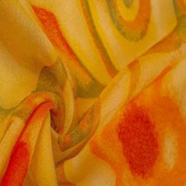 yellow fabric texture with abstract red print. luxury as abstract background. Luxury Christmas background. Fabric, delicate. Smooth elegant