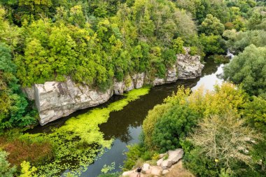 Amazing aerial view of Buky canyon on a sunny day. Buka canyon on the Girsky Tikich river, Cherkasy region, Ukraine. Concept, travel outdoor recreation