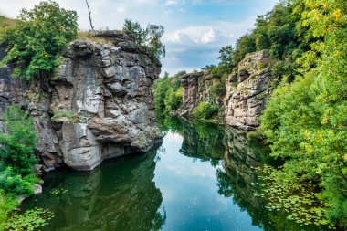 Amazing aerial view of Buky canyon on a sunny day. Buka canyon on the Girsky Tikich river, Cherkasy region, Ukraine. Concept, travel outdoor recreation