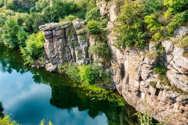 Amazing aerial view of Buky canyon on a sunny day. Buka canyon on the Girsky Tikich river, Cherkasy region, Ukraine. Concept, travel outdoor recreation