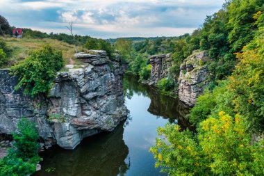Amazing aerial view of Buky canyon on a sunny day. Buka canyon on the Girsky Tikich river, Cherkasy region, Ukraine. Concept, travel outdoor recreation