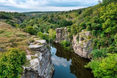 Amazing aerial view of Buky canyon on a sunny day. Buka canyon on the Girsky Tikich river, Cherkasy region, Ukraine. Concept, travel outdoor recreation