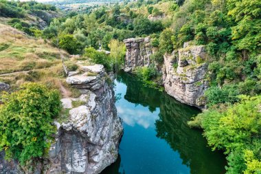 Amazing aerial view of Buky canyon on a sunny day. Buka canyon on the Girsky Tikich river, Cherkasy region, Ukraine. Concept, travel outdoor recreation