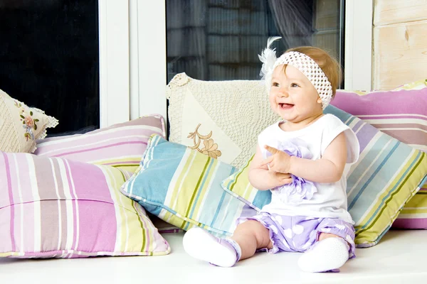 Little baby girl in hat with flower — Stock Photo, Image