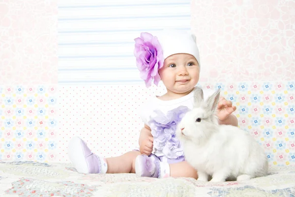 Little girl with rabbit — Stock Photo, Image